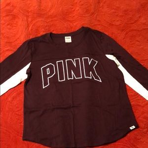 Pink 3/4 sleeve shirt.